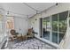 Covered patio with string lights and comfortable seating, perfect for relaxing outdoors at 2652 Laser Ct, Orlando, FL 32826