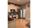 Modern kitchen with stainless steel appliances, white cabinets, and a convenient pantry at 6327 Southbridge St, Windermere, FL 34786