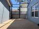 Spacious screened patio perfect for outdoor living, featuring durable concrete flooring and privacy at 6327 Southbridge St, Windermere, FL 34786