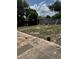 Backyard featuring a partially-covered patio area and plenty of open space at 1909 Lady Ave, Ocoee, FL 34761