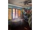 Bright bedroom with a window with drapes and a ceiling fan and a metal shelving unit at 1909 Lady Ave, Ocoee, FL 34761