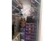 A closet filled with a variety of items, including clothes, bins, and personal belongings at 1909 Lady Ave, Ocoee, FL 34761