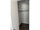 Walk-in closet featuring wood-look flooring and ample shelving for storage at 1909 Lady Ave, Ocoee, FL 34761