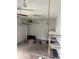 Spacious garage with workbench, shelving, and ample storage space at 1909 Lady Ave, Ocoee, FL 34761