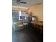 Another shot of the living room showing more of the room with a dining table and chair and a ceiling fan at 1909 Lady Ave, Ocoee, FL 34761