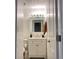 Bathroom with updated vanity, mirror and lighting at 2141 Lake Margaret Dr # 11, Orlando, FL 32806