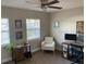 Bright office/bedroom with two windows, fan, and neutral paint at 2141 Lake Margaret Dr # 11, Orlando, FL 32806