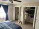 Spacious main bedroom including two closets and a window, complete with carpet flooring at 2141 Lake Margaret Dr # 11, Orlando, FL 32806