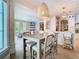 Open dining area next to the living room and kitchen, filled with natural light at 2614 Parkland Dr, Winter Park, FL 32789