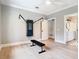 Bright exercise room with wood floors and fitness equipment at 2614 Parkland Dr, Winter Park, FL 32789
