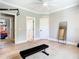 Bright exercise room with hardwood floors and an exercise bench at 2614 Parkland Dr, Winter Park, FL 32789