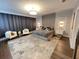 Serene bedroom with a plush bed, elegant lighting, and a stylish rug at 2926 Crest Wave Dr, Clermont, FL 34711