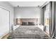 Cozy bedroom featuring a plush bed, neutral tones, and a serene ambiance at 2926 Crest Wave Dr, Clermont, FL 34711