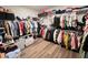 Spacious walk-in closet with ample hanging space and organization for clothes, shoes, and accessories at 2926 Crest Wave Dr, Clermont, FL 34711