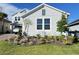 Charming single-Gathering home features a beautifully landscaped front yard at 2926 Crest Wave Dr, Clermont, FL 34711