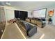 Spacious home theater featuring leather seating, large screen, and projector, perfect for Gathering movie nights at 2926 Crest Wave Dr, Clermont, FL 34711
