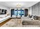 Spacious main bedroom featuring a plush bed, stylish decor, and plenty of natural light at 2926 Crest Wave Dr, Clermont, FL 34711