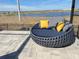 Inviting outdoor patio featuring a stylish round daybed and picturesque views of the lake, perfect for relaxing and enjoying the scenery at 2926 Crest Wave Dr, Clermont, FL 34711