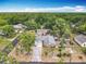 Spacious home with a large yard and mature trees, providing ample privacy and a serene setting at 1104 E University Ave, Deland, FL 32724
