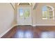 Inviting foyer featuring rich hardwood floors and glass paneled double doors at 11630 Flynn Ct, Winter Garden, FL 34787