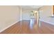 Spacious living area with gleaming hardwood floors, archways, and natural light at 11630 Flynn Ct, Winter Garden, FL 34787