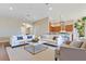 Spacious open-concept living area connects seamlessly to the kitchen, creating an ideal space for entertaining at 11630 Flynn Ct, Winter Garden, FL 34787