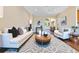 Comfortable living room with hardwood floors, modern furnishings, and natural lighting at 11630 Flynn Ct, Winter Garden, FL 34787