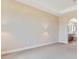 Large main bedroom offers generous space, neutral tones, and a glimpse into the luxurious ensuite bathroom at 11630 Flynn Ct, Winter Garden, FL 34787