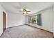 Bedroom with ceiling fan and large window providing plenty of natural light at 1220 Rolling Ln, Casselberry, FL 32707