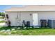 Exterior of home with a closed white door at 13624 Springtide Ct, Orlando, FL 32826
