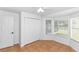 Bright bedroom with tile flooring, closet, ceiling fan and bay window at 13624 Springtide Ct, Orlando, FL 32826