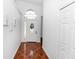 Bright foyer with beautiful flooring and a lovely front door with sidelights at 13624 Springtide Ct, Orlando, FL 32826