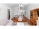 Open concept living and dining area showing lots of natural light and flooring at 13624 Springtide Ct, Orlando, FL 32826