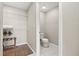 Modern bathroom with a toilet, ample storage, and closet space at 14501 Grove Resort Ave # 1441, Winter Garden, FL 34787