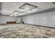 Large, modern event space with neutral walls, patterned floors, and elegant lighting fixtures at 14501 Grove Resort Ave # 1441, Winter Garden, FL 34787