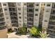 Upscale condominium building with private balconies and luxurious entrance at 14501 Grove Resort Ave # 1441, Winter Garden, FL 34787