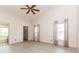 Spacious bedroom with vaulted ceiling, tile floors, and views to the backyard at 212 Hound Run Pl, Casselberry, FL 32707
