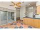 Eat-in kitchen features stylish terra cotta tiled flooring and sliding glass doors to an outdoor lanai at 212 Hound Run Pl, Casselberry, FL 32707
