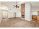 Spacious living room with a brick fireplace, tile flooring, and high ceilings offering an inviting space at 212 Hound Run Pl, Casselberry, FL 32707