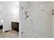 Bathroom features a glass-enclosed shower with decorative tile, and a wood-look floor at 260 Lake Smart Cir, Winter Haven, FL 33881