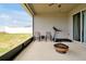 The screened patio includes a fire pit and exercise equipment, offering space for fitness and relaxation at 260 Lake Smart Cir, Winter Haven, FL 33881