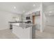 Modern kitchen features granite countertops, stainless appliances, and a center island at 3823 Pronghorn Dr, St Cloud, FL 34772