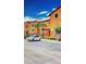 Lovely condo building featuring well-manicured greenery and ample parking at 5471 Vineland Rd # 7109, Orlando, FL 32811