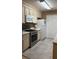 Functional kitchen featuring a full appliance package and generous storage at 5471 Vineland Rd # 7109, Orlando, FL 32811