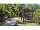 Community picnic area with a shelter, a grill, and a path at 5471 Vineland Rd # 7109, Orlando, FL 32811