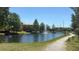 Beautiful pond with fountain and walking path offers a serene community setting at 5471 Vineland Rd # 7109, Orlando, FL 32811