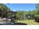 Scenic view of the pond from the community picnic area at 5471 Vineland Rd # 7109, Orlando, FL 32811