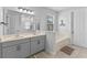 Bright bathroom with double vanity, soaking tub, and separate shower, offering a spa-like experience at 5981 Sierra Crown St, Mount Dora, FL 32757