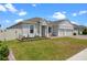 Charming single Gathering house with manicured lawn and 3 car garage at 5981 Sierra Crown St, Mount Dora, FL 32757