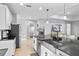Open kitchen design featuring a stainless steel sink, modern appliances, and ample counter space at 5981 Sierra Crown St, Mount Dora, FL 32757